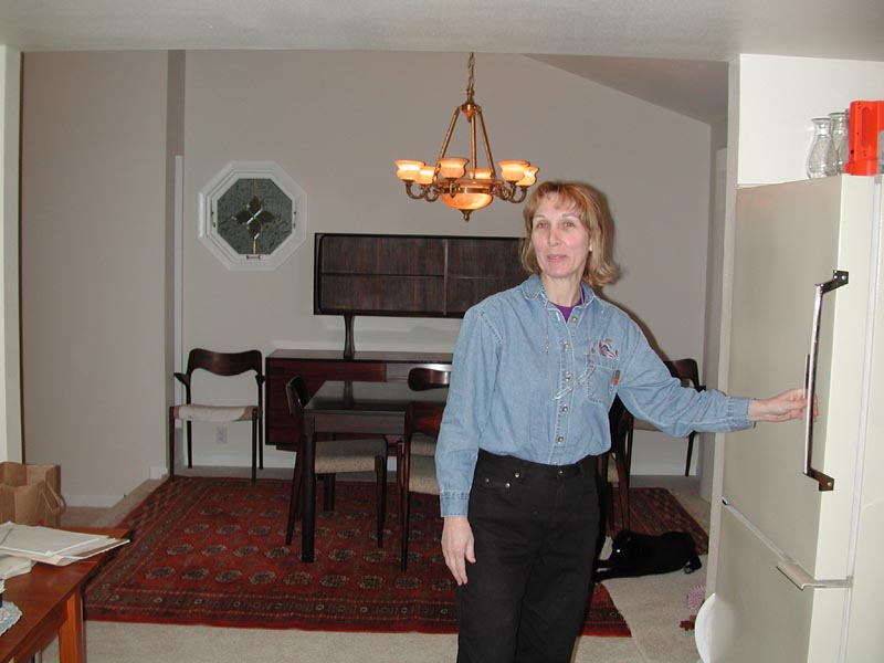 Carol in kitchen and dining room.jpg 60.3K